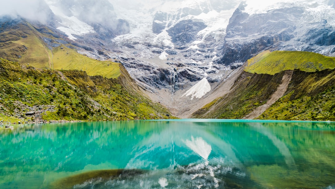 Mountain lake and peaks in the Peruvian Andes, inspiration for adventure routes