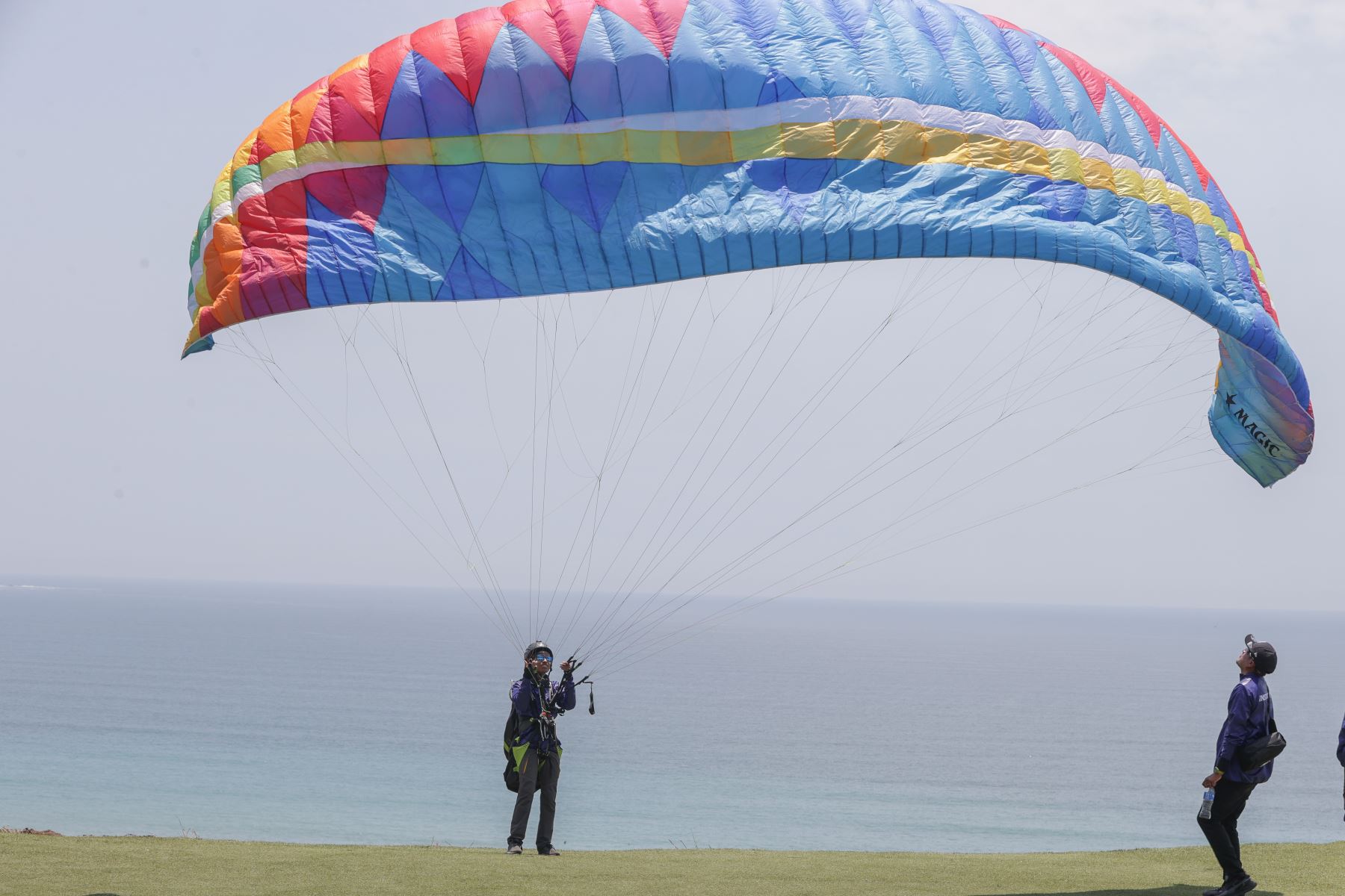 Fly in a paraglider over the Lima coast
