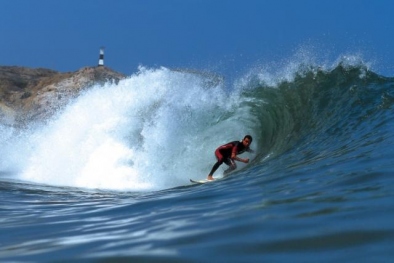 Surfing at La Herradura Beach