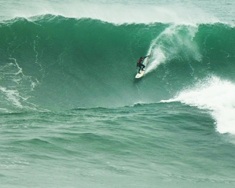 Surfing at Punta Rocas Beach
